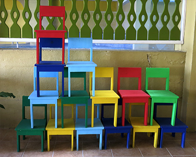 guatemala flores bright colored chairs