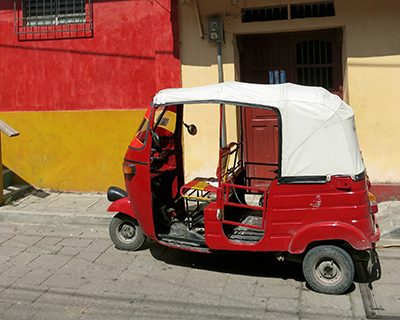 guatemala flores red bajaj taxi